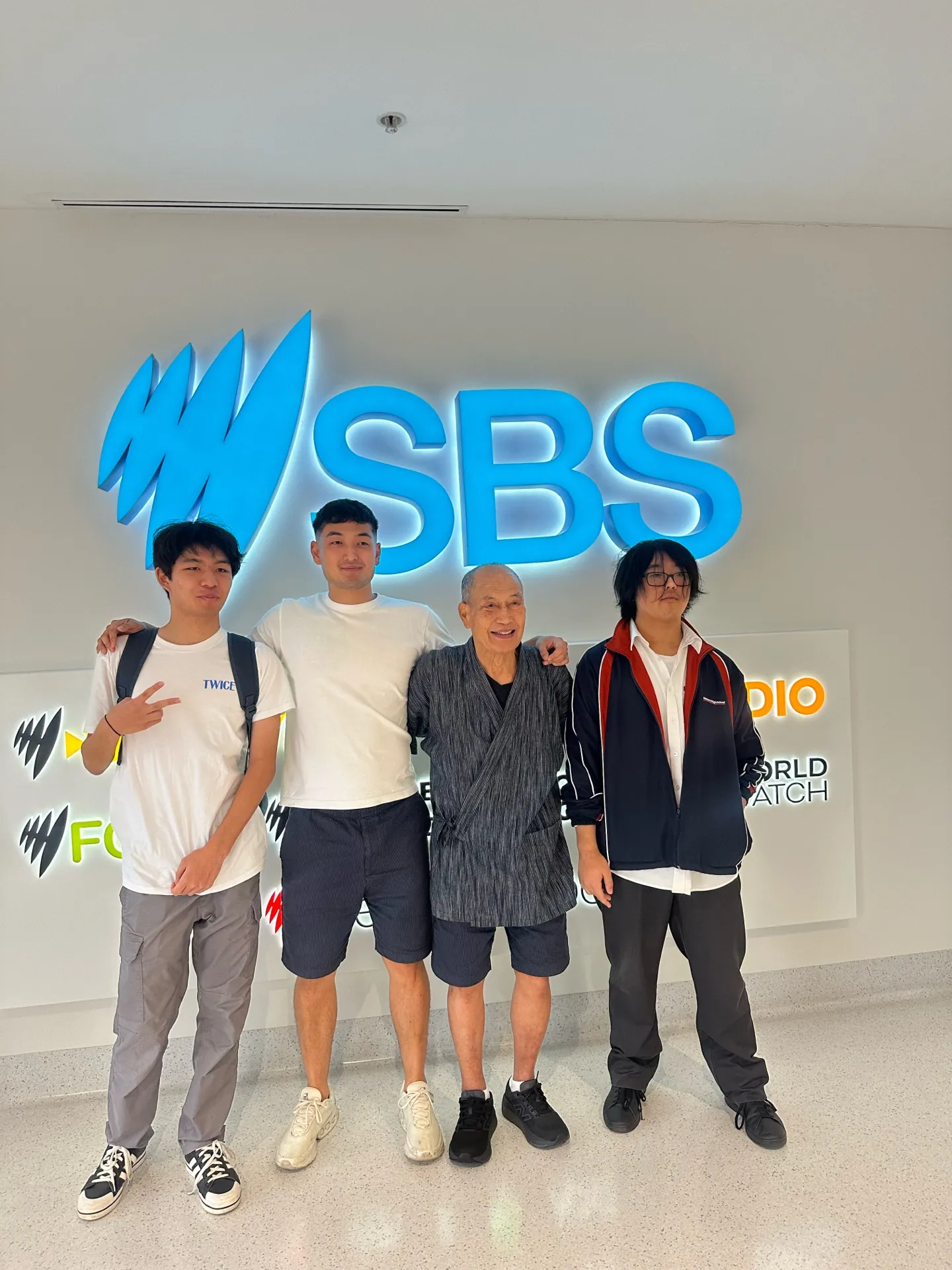 Harrison Saito with the group featured in the SBS World News segment
