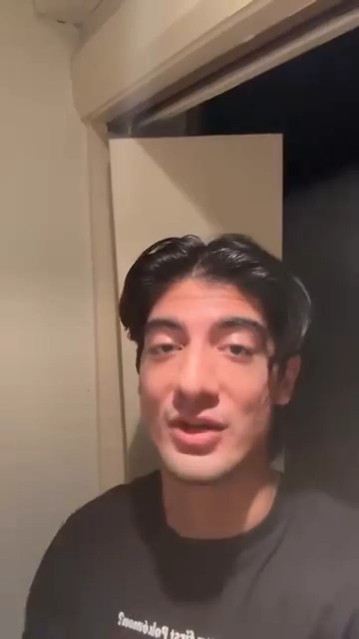 A client at home, filming his testimony on his phone