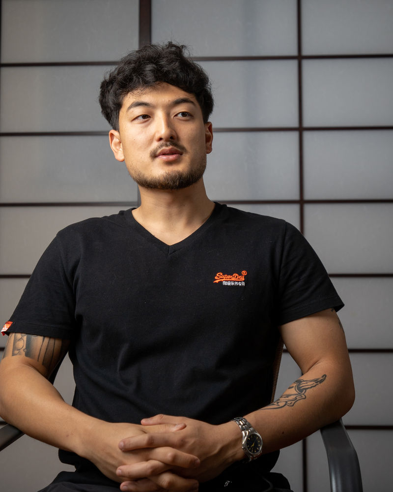 Harrison Saito — portrait with Japanese shoji screen backdrop